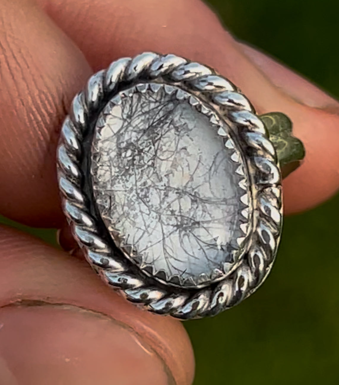oval memorial ring with ashes and fur