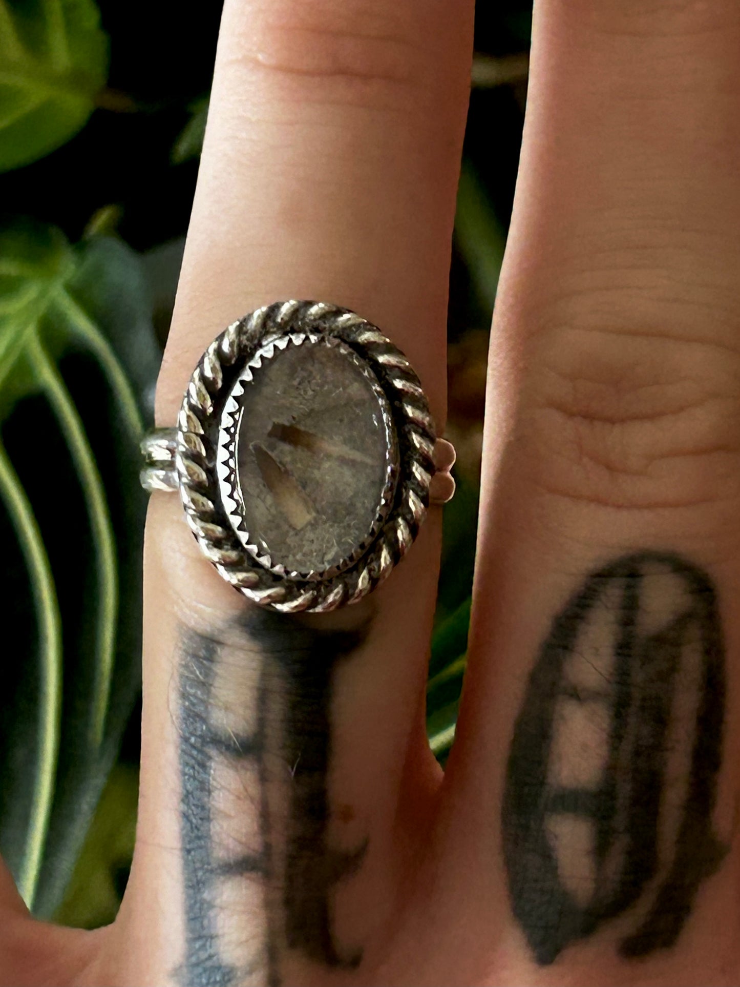 oval memorial ring with cremated remains and ash