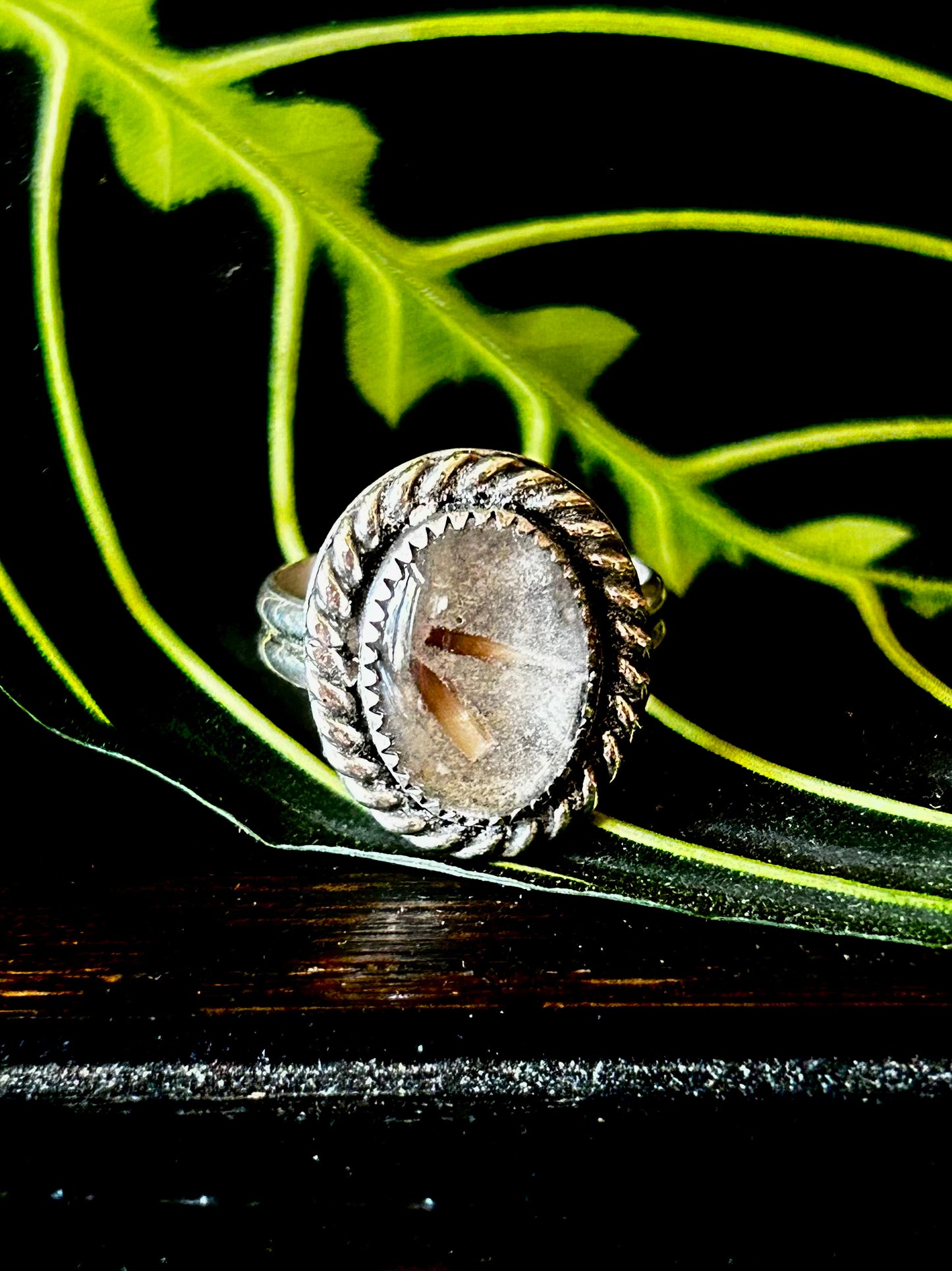 oval memorial ring with cremated remains and ash